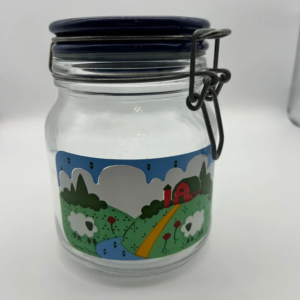 Vintage 1982 Nina Farm Scene Glass Jar Wire Bale Flip Top Lid Sheep Barn 7in‎